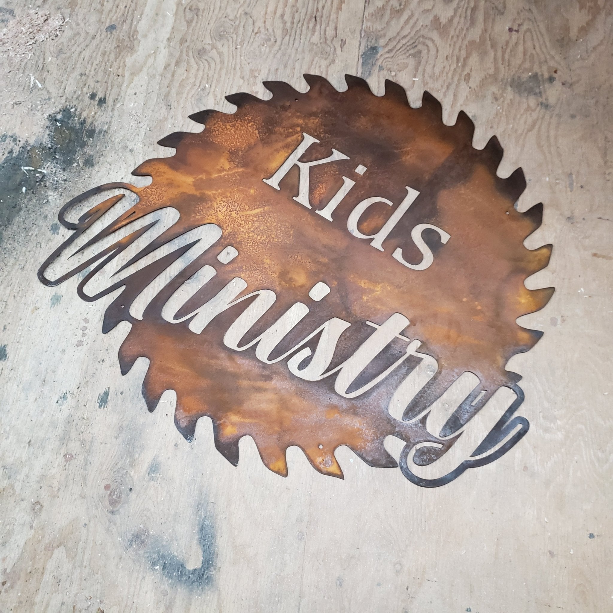 Personalized Metal Sawblade Family Name sign - Bison Peak DesignsFamily Name